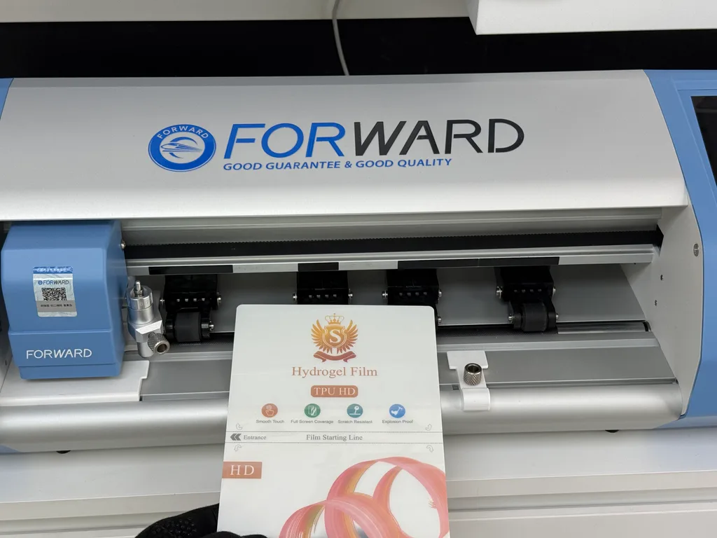 Hydrogel film sheet loaded into a screen protector cutting machine